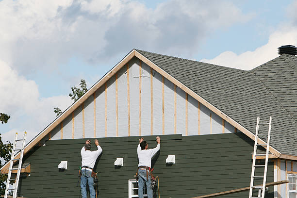 Professional Emergency Siding Repair technician working in Port Washington, OH